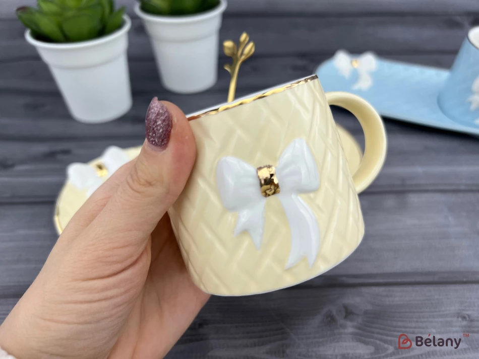 Керамічна чашка із блюдцем "Softy bow" кремова | 2
