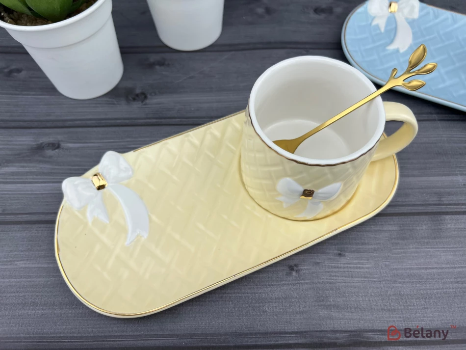 Керамічна чашка із блюдцем "Softy bow" кремова | 3